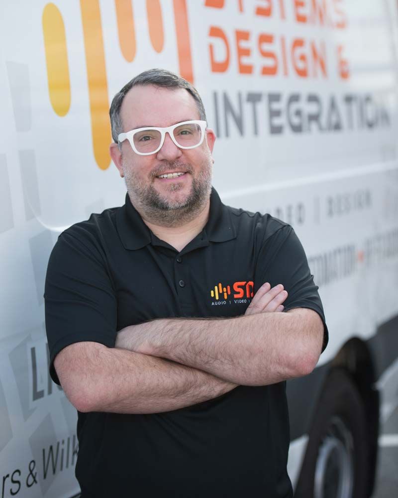 headshot of man, employee at SDI in boston